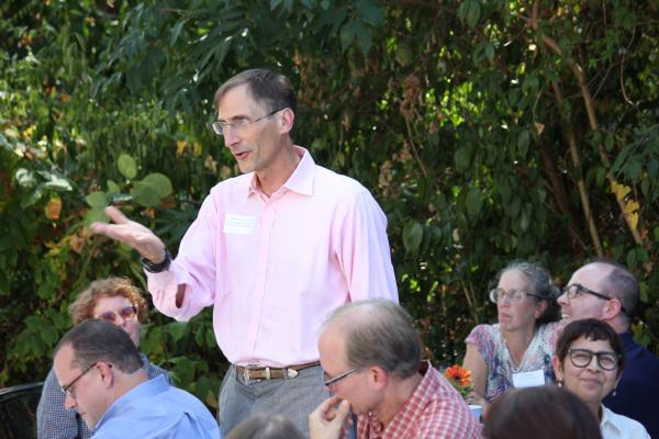 a photo of rudi colloredo-mansfeld speaking to a crowd